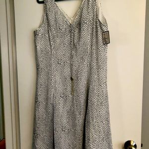 Doncaster black polka dot sheer dress.